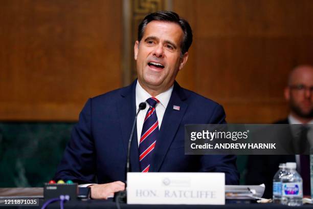 Rep. John Ratcliffe, R-TX, gives an opening statement before a Senate Intelligence Committee nomination hearing on Capitol Hill in Washington,DC on...