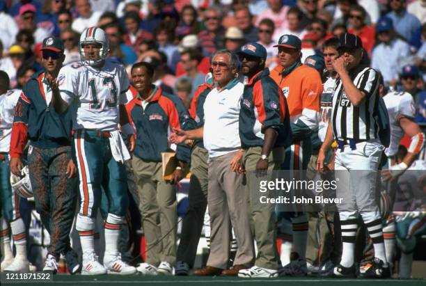 Miami Dolphins QB Dan Marino on sidelines with coach Don Shula and assistants during game vs Buffalo Bills at Rich Stadium. Orchard Park, NY...