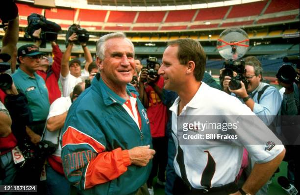 Miami Dolphins coach Don Shula with son and Cincinnati Bengals coach David Shula before game at Riverfront Stadium. Cincinnati, OH 10/2/1994 CREDIT:...