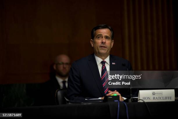 Nominee John L. Ratcliffe sits during a Senate Intelligence Committee nomination hearing at the Dirksen Senate Office building on Capitol Hill on...