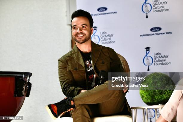 Luis Fonsi participates in a conversation as the Latin GRAMMY Cultural Foundation donates musical instruments to Escuela Especializada de Bellas...