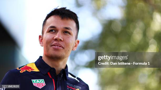 Alexander Albon of Thailand and Red Bull Racing looks on in the Paddock during previews ahead of the F1 Grand Prix of Australia at Melbourne Grand...