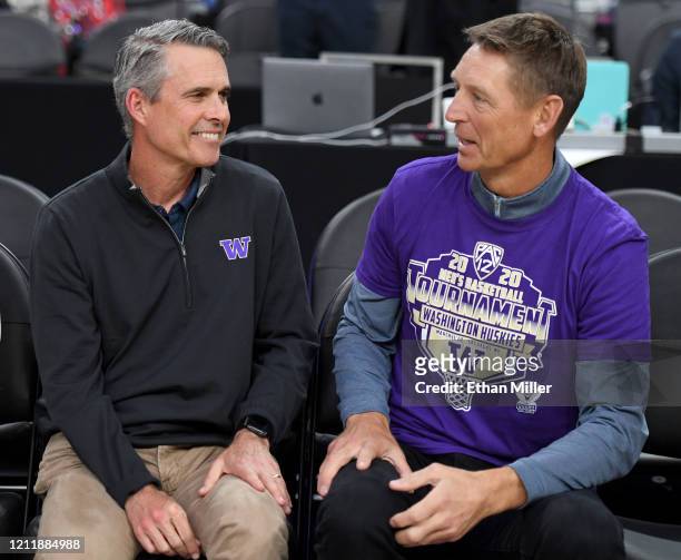 Former head football coach of the Washington Huskies Chris Petersen and former NBA player Detlef Schrempf attend a first-round game of the Pac-12...