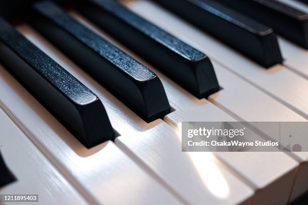 piano keys - piano stock pictures, royalty-free photos & images