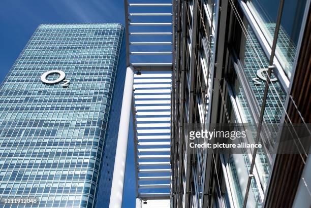 May 2020, Bavaria, Munich: The logo of the telecommunications provider O2 can be seen at the German headquarters on the Uptown high-rise. O2 is the...