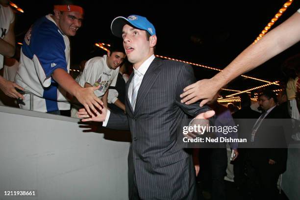 Redick high-fives fans after being selected eleventh by the Orlando Magic during the 2006 NBA Draft on June 28, 2006 at The Theater at Madison Square...