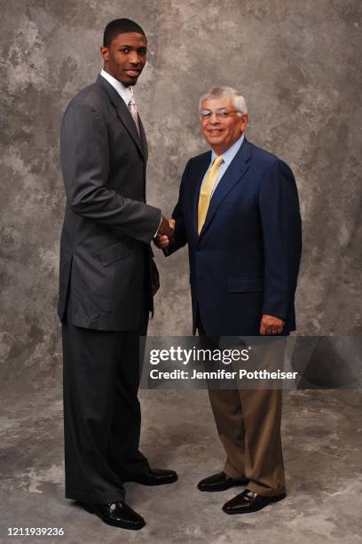 Hakim Warrick and NBA Commissioner David Stern pose for a photo during the 2005 NBA Draft on June 28, 2005 at the Theater at Madison Square Garden in...