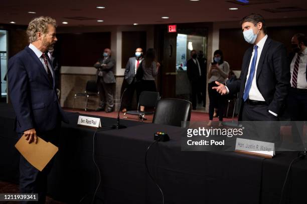 Sen. Rand Paul, R-Ky., talks with Judge Justin Walker before a Senate Judiciary Committee hearing on Walkers nomination to be United States Circuit...