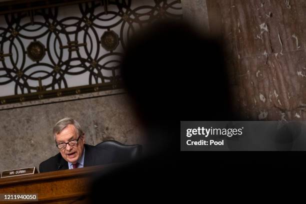 Sen. Richard Durbin, ., questions Judge Justin Walker as he testifies during a Senate Judiciary Committee hearing on his nomination to be United...