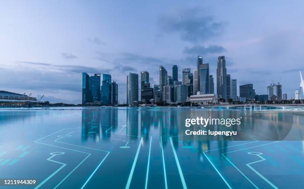 futuristic city of singapore - singapore cityscape stock pictures, royalty-free photos & images