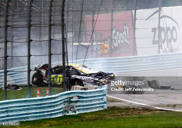 David Reutimann crashes the Aaron's Dream Machine Toyota into the wall after an incident in the NASCAR Sprint Cup Series Heluva Good! Sour Cream Dips...