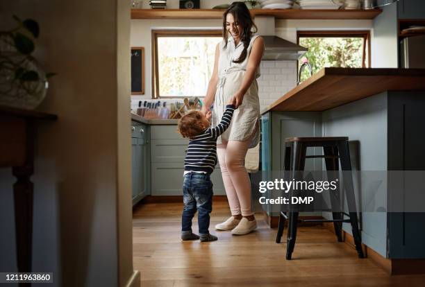 our kitchen is for dancing - small family stock pictures, royalty-free photos & images