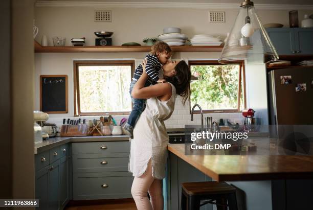 mom has an endless supply of love - family small kitchen stock pictures, royalty-free photos & images