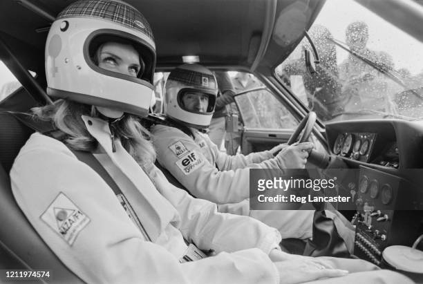 British Formula One racing driver Jackie Stewart and his wife, Helen, drive around the Circuit Paul Ricard in Le Castellet, France, 4th September...