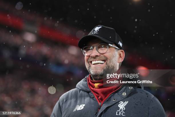 Jurgen Klopp, Manager of Liverpool looks on with a smile ahead of the UEFA Champions League round of 16 second leg match between Liverpool FC and...
