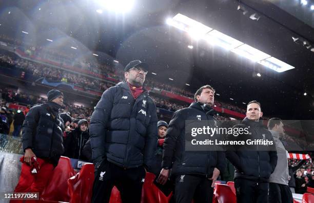 L-r Jurgen Klopp, Manager of Liverpool stands with Assistant Managers, Peter Krawietz and Pepijn Lijnders ahead of the UEFA Champions League round of...