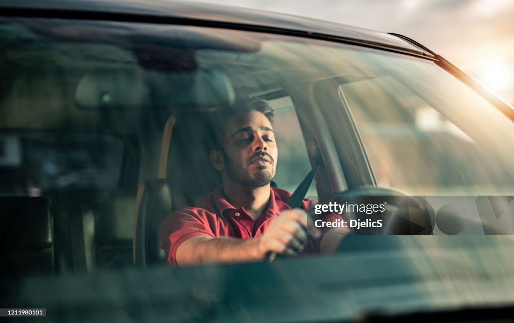 Falling asleep while driving a car.