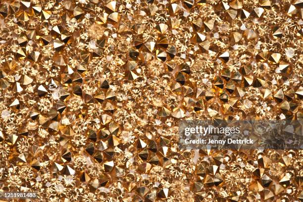 gold rhinestones - rhinestone stock pictures, royalty-free photos & images