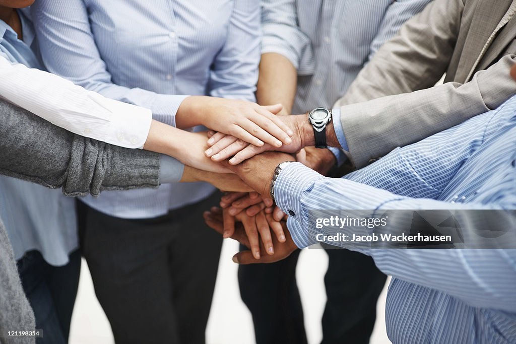 Closeup of a business people with hands together