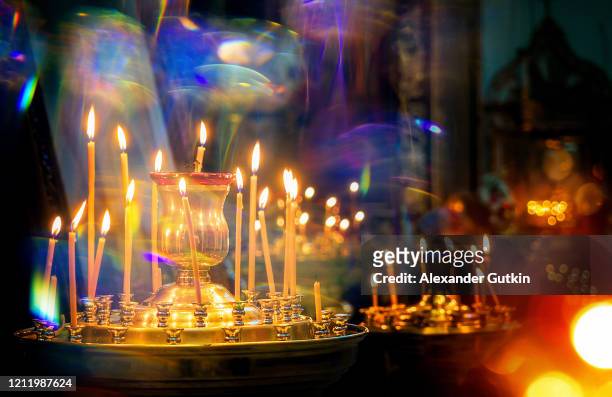 candles in the dark orthodox church, panicadilo - russia celebrates orthodox easter bildbanksfoton och bilder