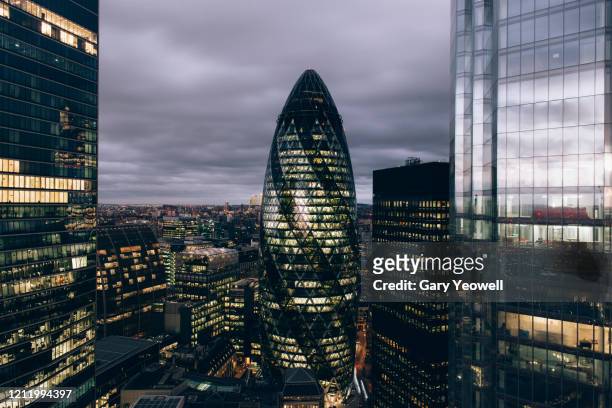 elevated view over london city skyline at sunset - city von london stock-fotos und bilder