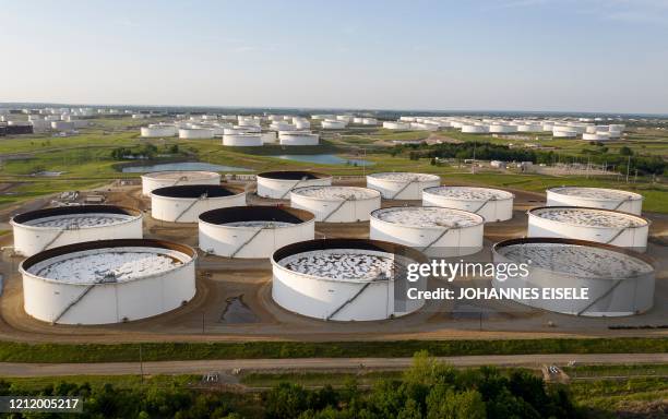 An aerial view of a crude oil storage facility is seen on May 4, 2020 in Cushing, Oklahoma. - Using his fleet of drones, Dale Parrish tracks one of...