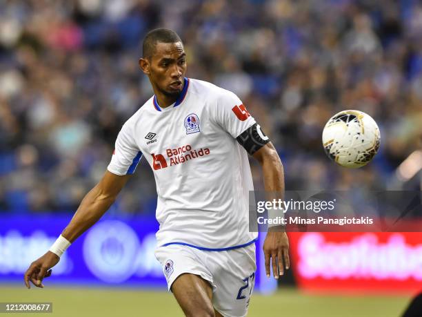 Jerry Bengtson of CD Olimpia watches the ball against the Montreal Impact in the first half during the 1st leg of the CONCACAF Champions League...