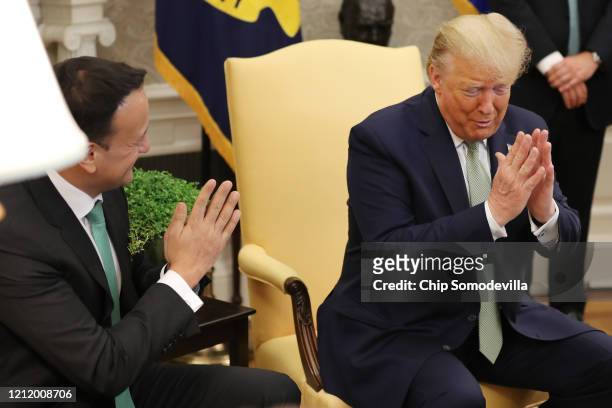 President Donald Trump and Prime Minister of Ireland Leo Varadkar show how they greeted each other while talking to journalists before their meeting...