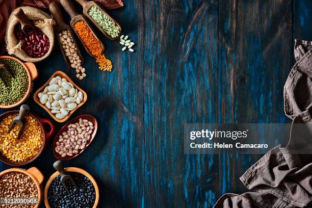 legumes and beans on a rustic wooden table with copy space - black eyed peas food stock pictures, royalty-free photos & images