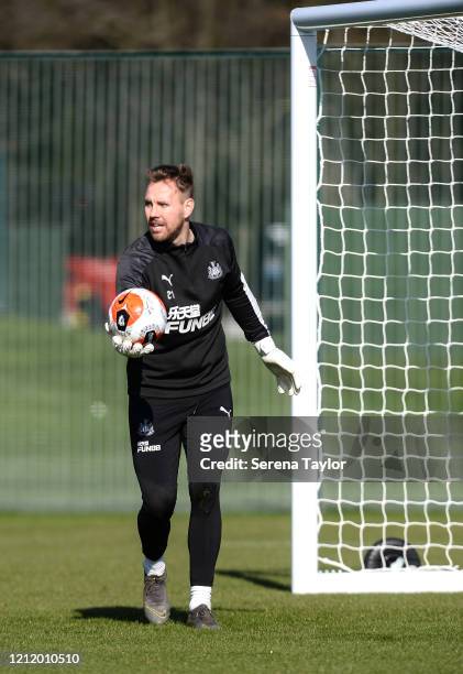 Goalkeeper Rob Elliot holds the ball during the Newcastle United Training Session at the Newcastle United Training Centre on March 05, 2020 in...
