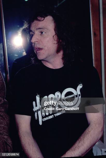 View of Scottish Rock, Jazz, and Blues musician Jack Bruce as he stands backstage at the Palladium, New York, New York, December 13, 1980. He had,...