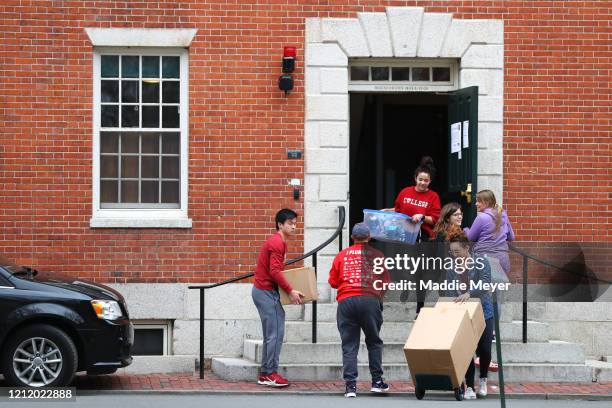 Students move out of dorm rooms on Harvard Yard on the campus of Harvard University on March 12, 2020 in Cambridge, Massachusetts. Students have been...