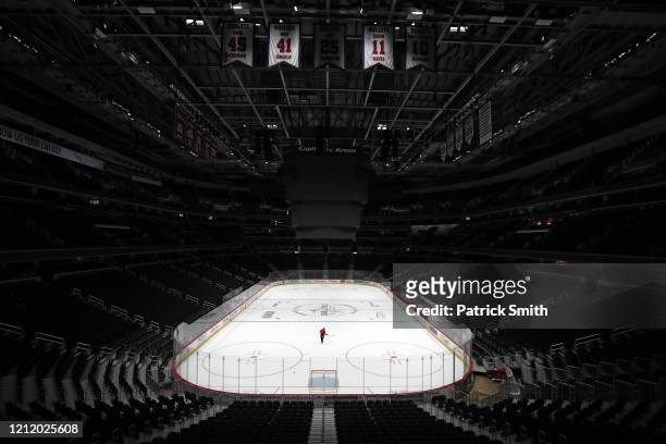 Sam Hess, Operations with Monumental Sports & Entertainment, skates alone prior Detroit Red Wings playing against the Washington Capitals at Capital...
