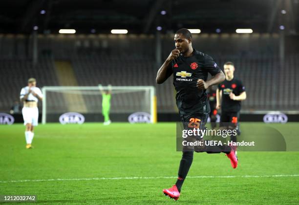 In this handout image provided by UEFA, Odion Ighalo of Manchester United celebrates after scoring his team's first goal during the UEFA Europa...