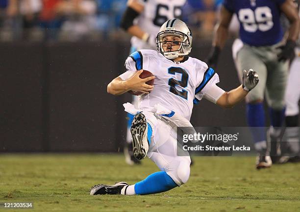 Jimmy Clausen of the Carolina Panthers during their preseason game against the New York Giants at Bank of America Stadium on August 13, 2011 in...