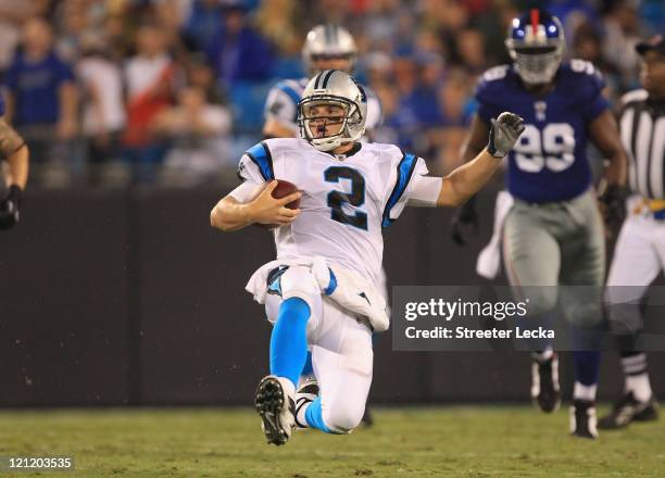 Jimmy Clausen of the Carolina Panthers during their preseason game against the New York Giants at Bank of America Stadium on August 13, 2011 in...