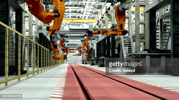 robots dans l’usine du futur - manufacturing equipment photos et images de collection