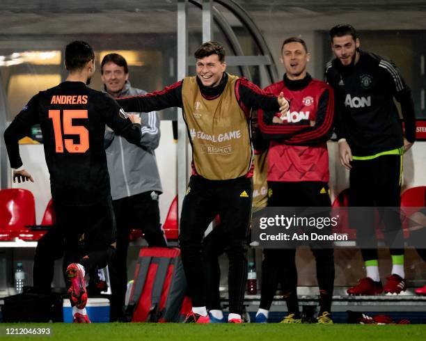 Andreas Pereira of Manchester United celebrates scoring their fifth goal goal during the UEFA Europa League round of 16 first leg match between LASK...