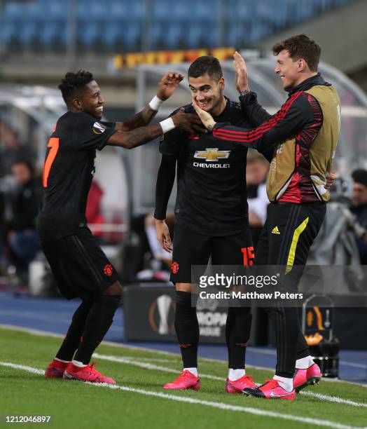 Andreas Pereira of Manchester United celebrates scoring their fifth goal goal during the UEFA Europa League round of 16 first leg match between LASK...