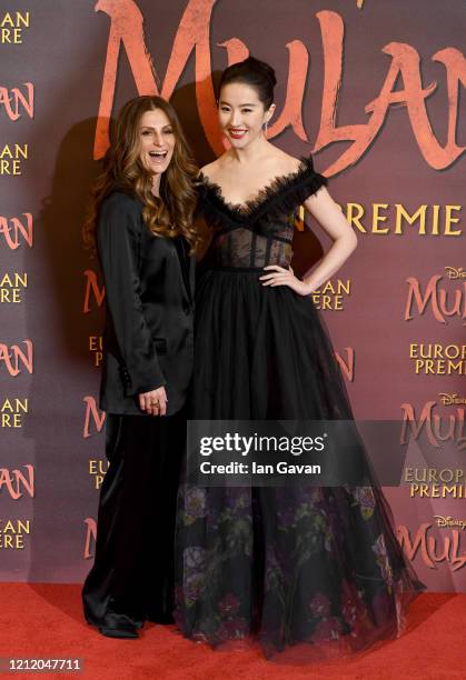 Niki Caro and Yifei Liu attend the European Premiere of Disney's "MULAN" at Odeon Luxe Leicester Square on March 12, 2020 in London, England.