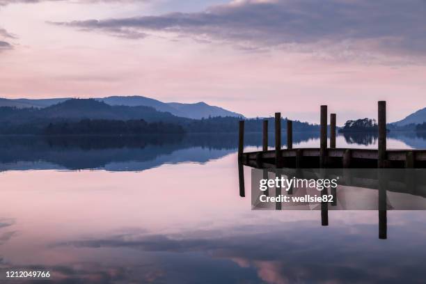 purple hues over derwent water - see coniston water stock-fotos und bilder