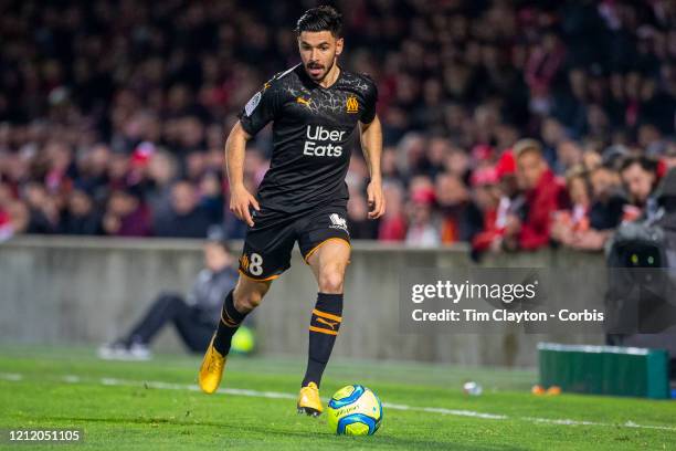 February 28: Morgan Sanson of Marseille in action during the Nimes V Marseille, French Ligue 1, regular season match at Stade des Costieres on...