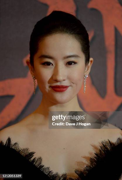 Yifei Liu attends the "Mulan" photocall at Trafalgar Hotel on March 13, 2020 in London, England.