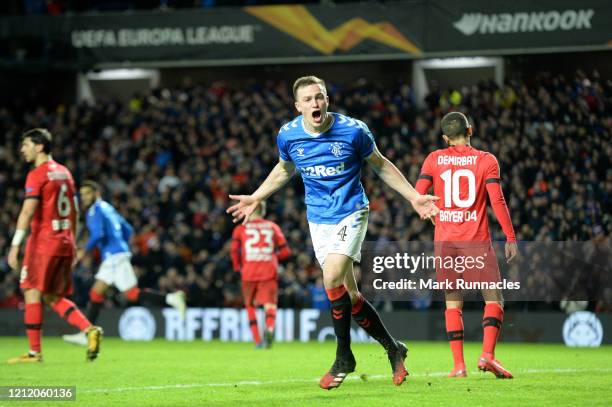 George Edmundson of Rangers FC celebrates after scoring his team's first goal during the UEFA Europa League round of 16 first leg match between...