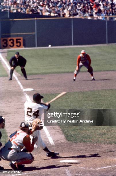 Willie Mays of the San Francisco Giants swings at the pitch during an MLB game against the Cincinnati Reds on April 20, 1961 at Candlestick Park in...