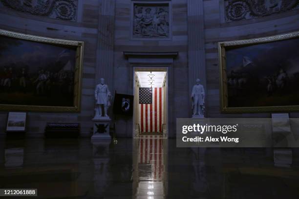 The Rotunda at the U.S. Capitol is empty after the last tour group has passed through March 12, 2020 on Capitol Hill in Washington, DC. The U.S....