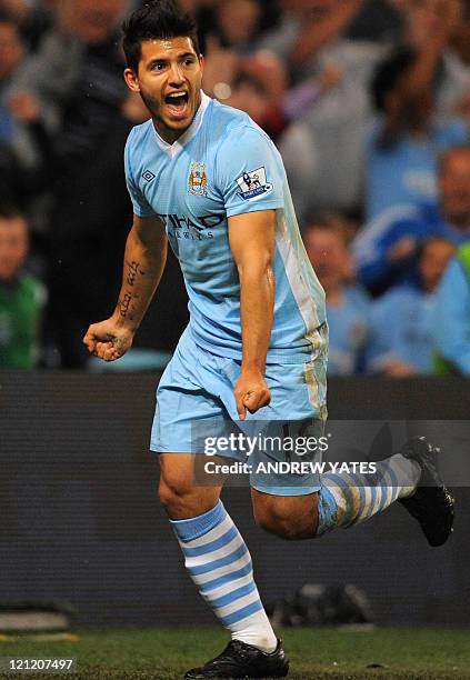 Manchester City's Argentinian forward Sergio Agüero celebrates after scoring during the English Premier League football match between Manchester City...