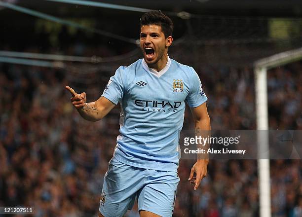 Sergio Aguero of Manchester City celebrates after scoring the second goal during the Barclays Premier League match between Manchester City and...