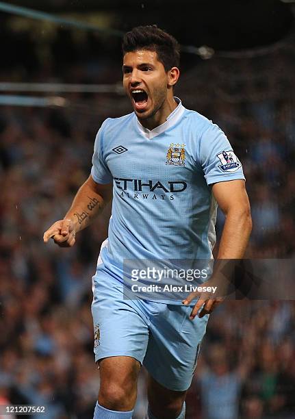 Sergio Aguero of Manchester City celebrates after scoring the second goal during the Barclays Premier League match between Manchester City and...
