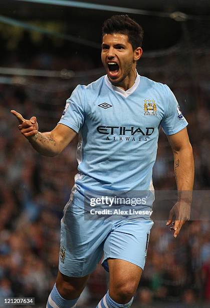 Sergio Aguero of Manchester City celebrates after scoring the second goal during the Barclays Premier League match between Manchester City and...